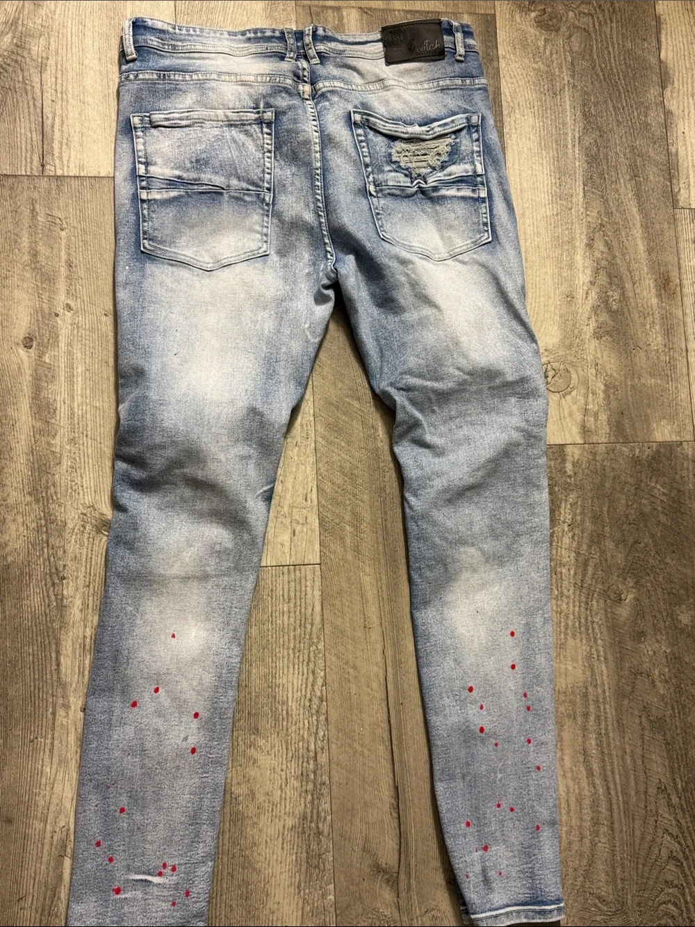 Men's Light Blue Skinny Distressed Jeans with Red Paint Detail - Picture 6 of 7